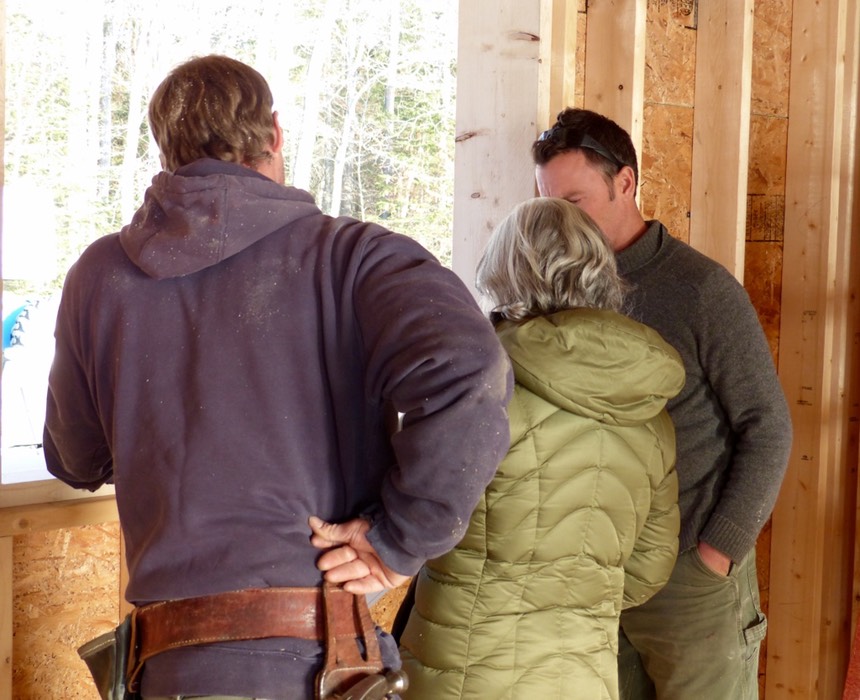 Architect talking to builders